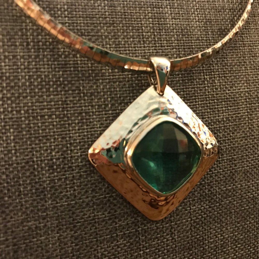 Translucent Green Gem in Hammered Silver Pendant